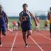 Chelsea's Berkley Edwards during the boys 100 years dash at the Golden Triangle boys and girls track meet at Saline High School Friday, May 3.
Courtney Sacco I AnnArbor.com